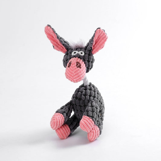 A plush interactive squeaky dog toy designed to resemble a donkey, with gray body, pink inner ears, and a pink nose.


